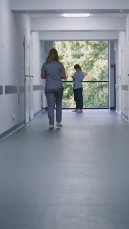 hospital corridor with medical staff