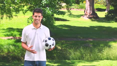 young man playing with a ball