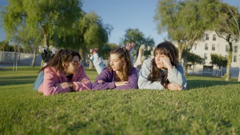 friends laying in a park