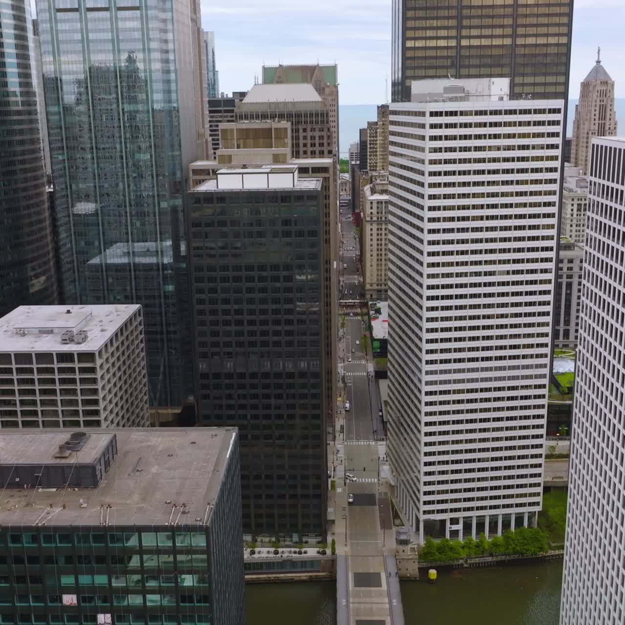 Huge massive building standing close to each other. Densely built area of modern Chicago, Illinois. Top view