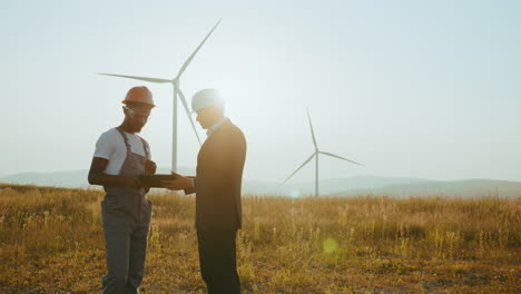 business meeting on wind farm