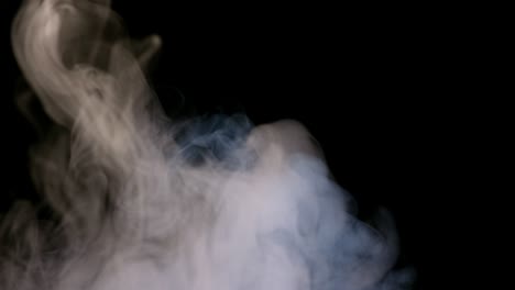 white water vapour on a black background