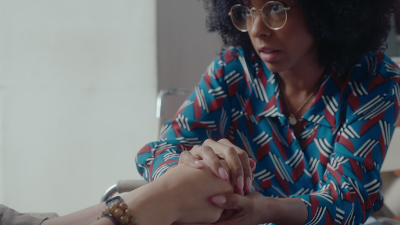 Empathic Female Therapist Supporting and Consoling Patient