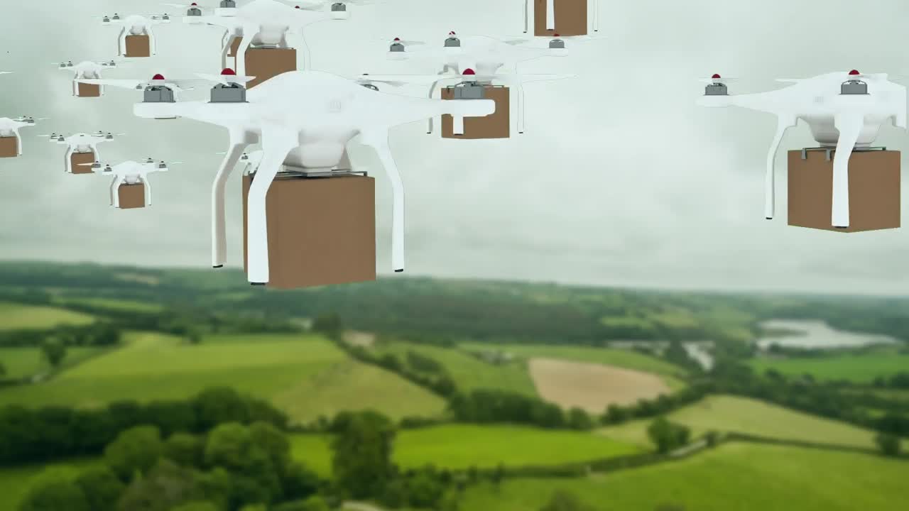 상자를 들고 하늘을 날아다니는 드론