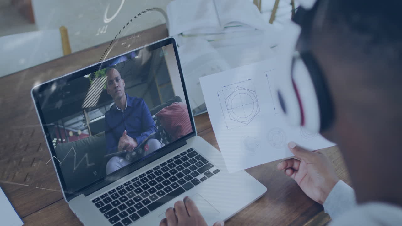 Wearing headphones, person holding technical drawings in online meeting animation