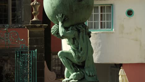 hercules statue in portmeirion village, north wales, uk