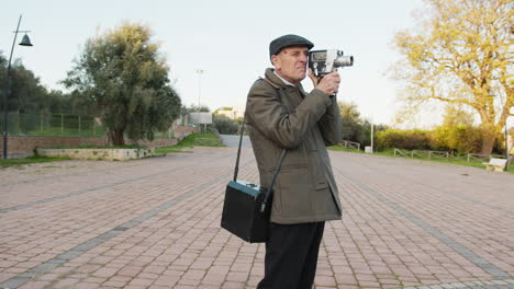 south italy man shoots with his old camcorder in the public park