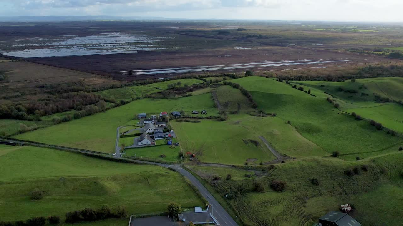 A 4K forward drone shot of Ireland's Turf Bogs as EU insists on bog preservation Co Offaly Ireland