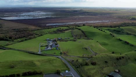 A 4K forward drone shot of Ireland&#039;s Turf Bogs as EU insists on bog preservation Co Offaly Ireland