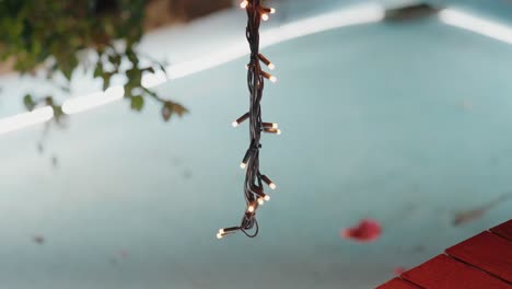 twinkling lights with blurred water backdrop