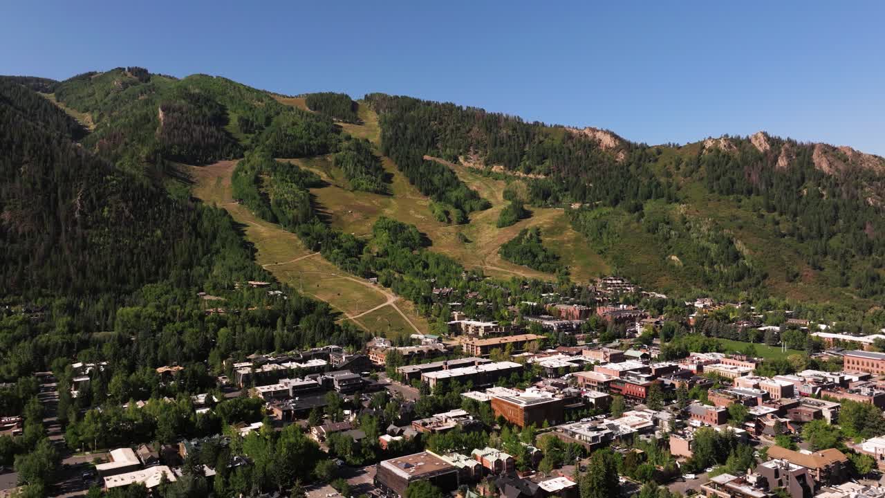 Scenic Aerial View Above Aspen, Colorado on Colorful Summer Afternoon in Mountain Town