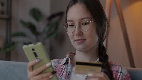 woman shopping online with credit card