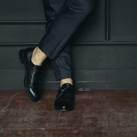 close up of man legs in elegant shoes