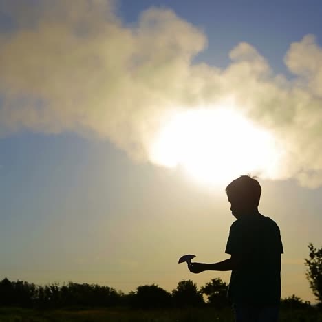 paper airplane in child hand