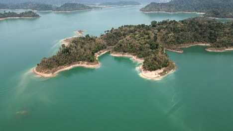 aerial view of serene tropical lake with lush green islands