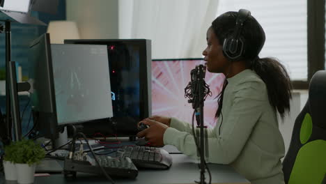 Afro-american-space-shooter-player-happy-after-winning-virtual-competiton