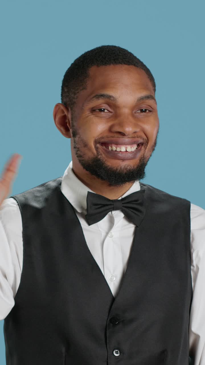 Friendly African American Man Smiling and Waving