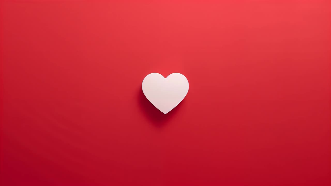 Cuore bianco che fluttua e rimane centrato su uno sfondo rosso, con ombre tenui