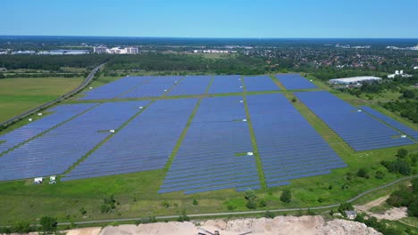 large solar farm in germany, providing clean and sustainable energy. smooth aerial view flight overflight flyover drone