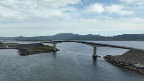 Beautiful-aerial-view-of-Storseisundet-bridge-along-the-world-famous-Atlantic-Ocean-Road-in-Norway