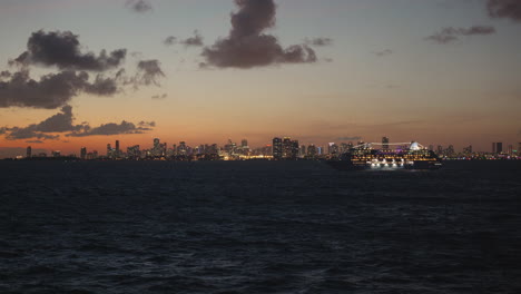 miami skyline at sunset with cruise ship