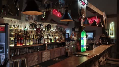 cozy bar interior with wooden bar and drinks