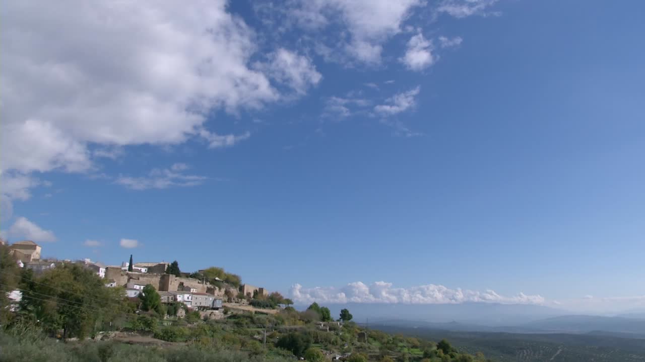 Hilltop Village in Spain under a Blue Sky