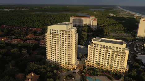 aerial view panning left of the luau condominium in san destin florida