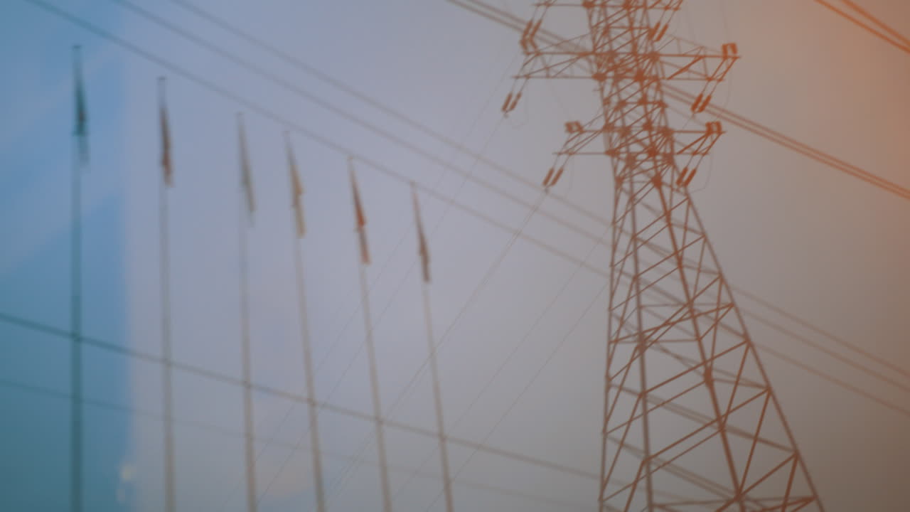 Looking at transmission tower from moving train