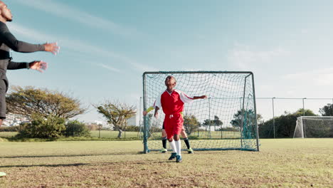Youth soccer game with players in action