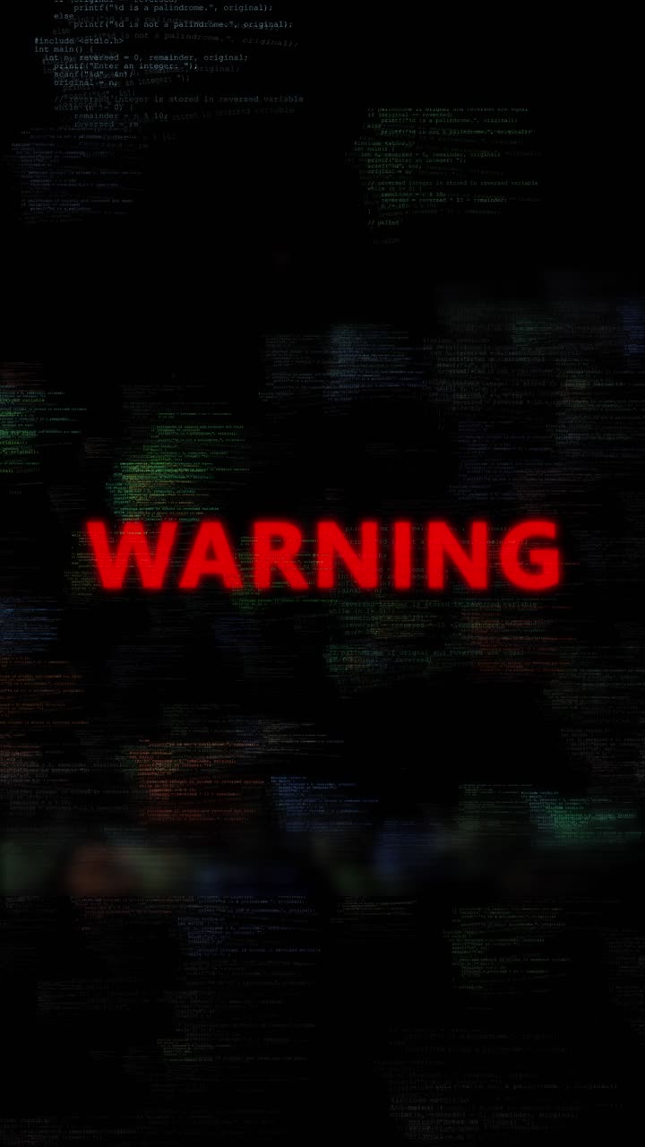 Digital footage glitch animation red warning text against scrolling multicolored programming code