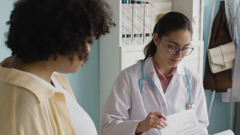 medical consultation with a pregnant woman