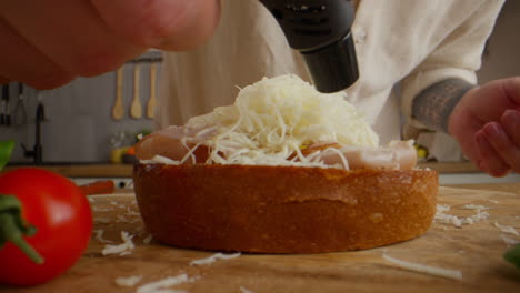 making a delicious cheese and ham sandwich
