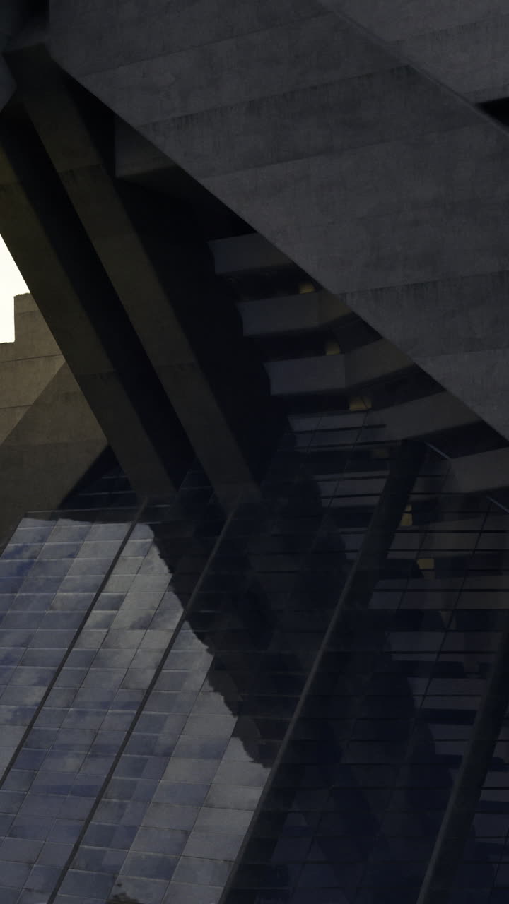 Modern building structure and reflection during evening hours in city
