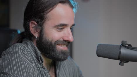 man recording music in a home studio