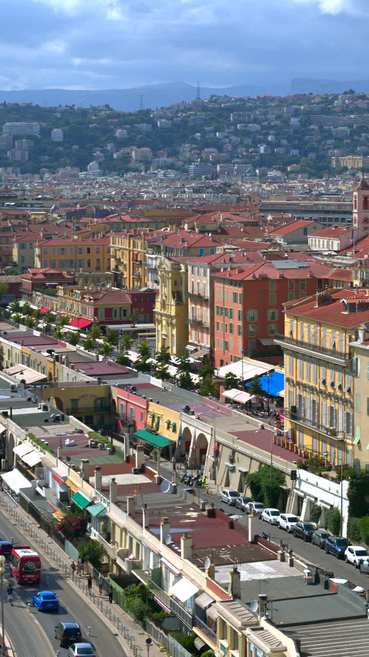 Aerial view of the coastline of Nice, France in daylight. Vertical
