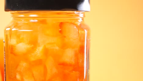orange marmalade in a glass jar