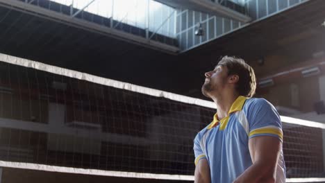 male volleyball player playing volleyball in the court 4k