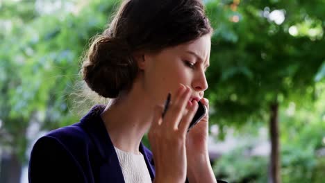 Woman-talking-on-mobile-phone