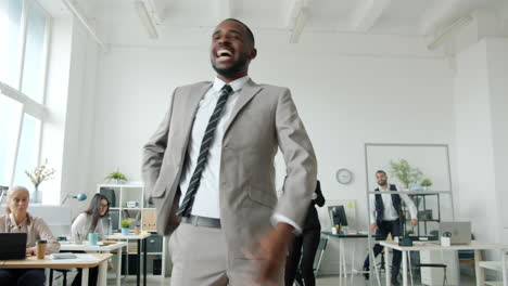 happy office workers celebrating