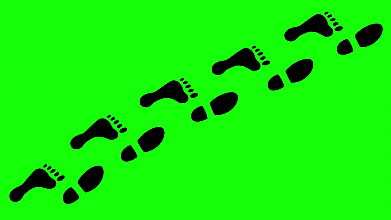 A mixed track of black footprints made by one shoe and one naked foot, appearing on a green background