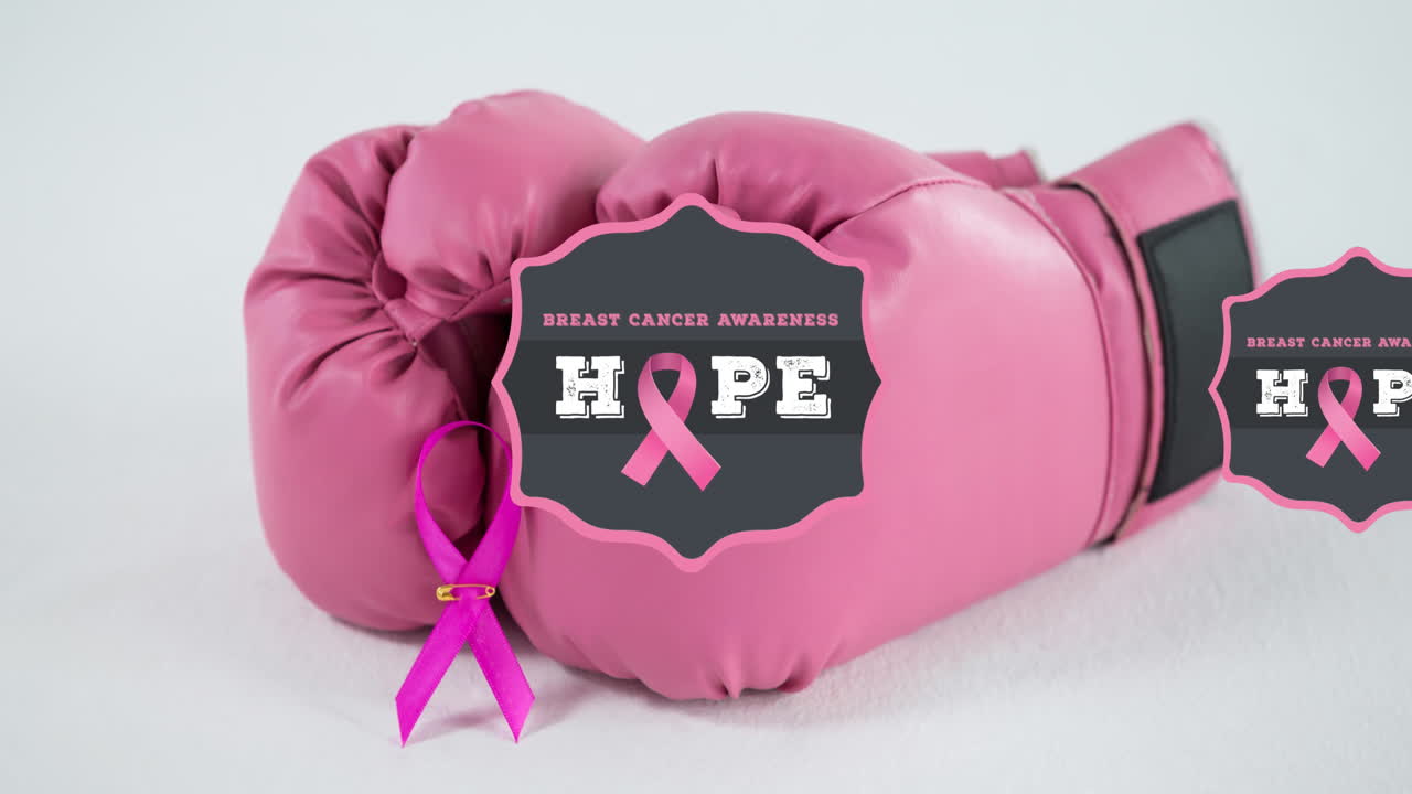 animación de texto de concienciación sobre el cáncer de mama sobre guantes de boxeo rosados