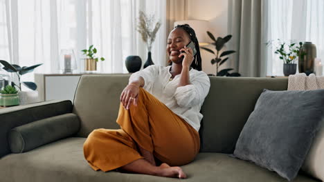 Black-woman-on-sofa,-relax