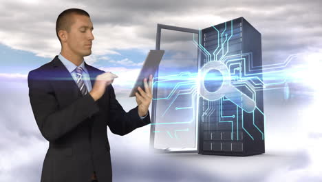 businessman using tablet computer in front of server tower on sky background