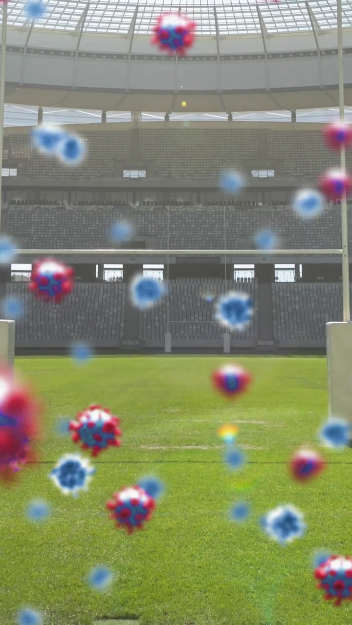 Animation af covid-19-celler over et tomt rugbystadion