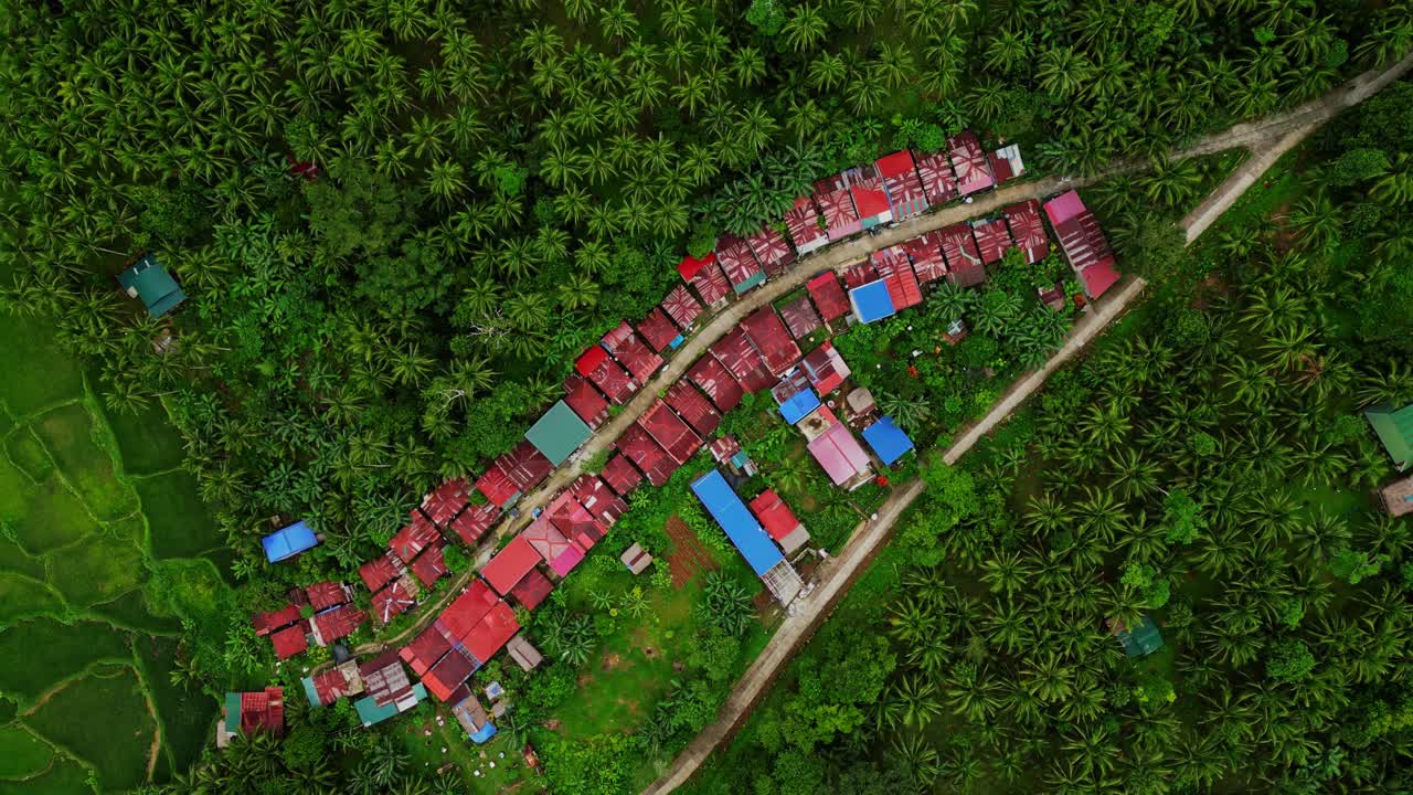 Immerse yourself in the visual poetry of Mahabang Tanaw's aerial panorama, a testament to the simple yet profound beauty of rural life in Lucban, Quezon