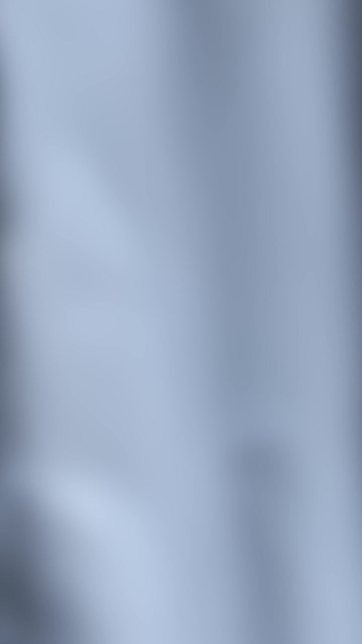 Gentle, abstract water flow effect over a white background with soft, diffused lighting