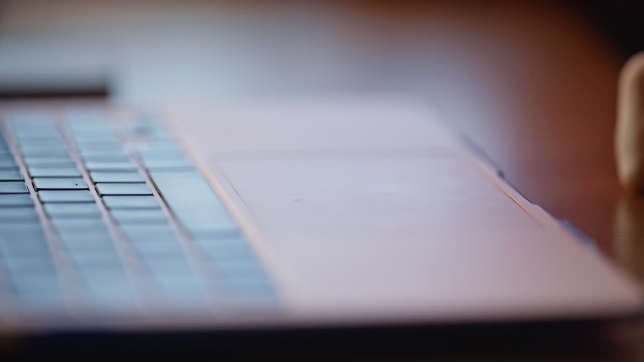 Close-up of a Laptop Keyboard and Trackpad