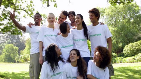 group of volunteers smiling at the camera