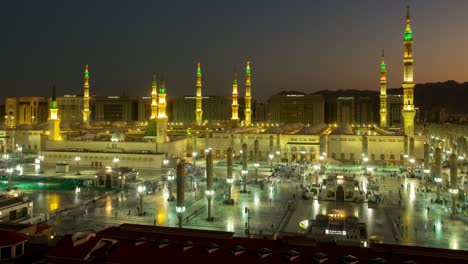 night to day morning transition time-lapse looking over the al masjid al abawi mosque in medina.